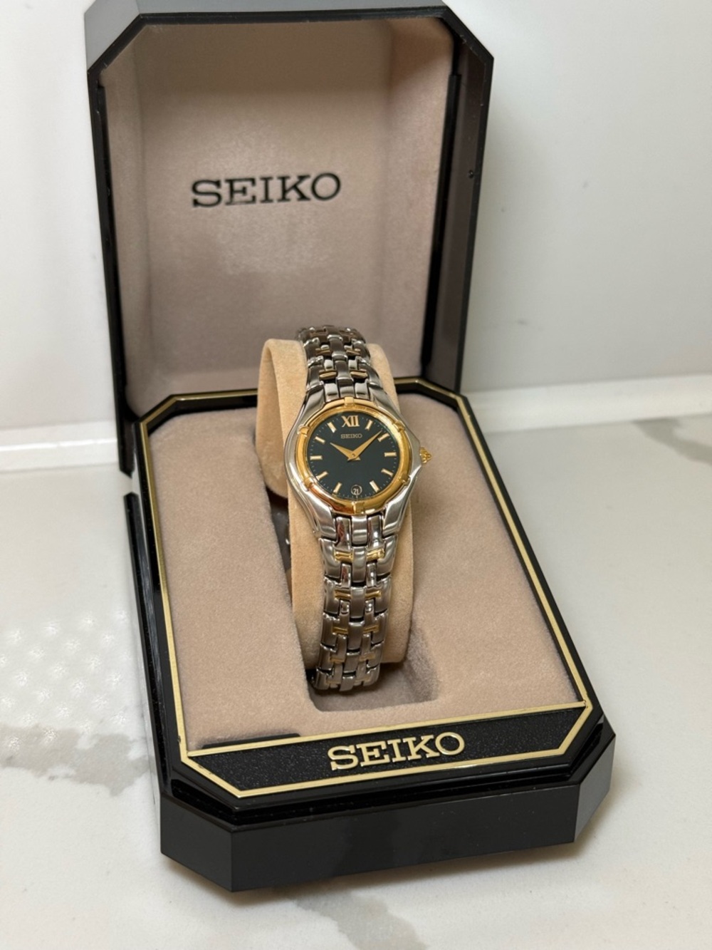 Seiko Two-Tone Silver and Gold Women's Dress Watch with Black Dial